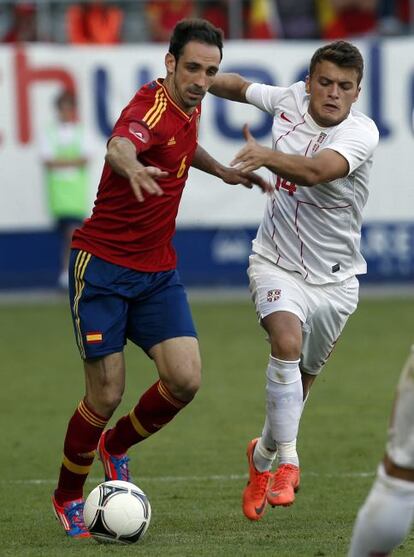 Juanfran con Adem Ljajic.