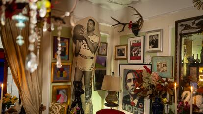 A life-size photograph of Michael Henry Adams’ father playing basketball dominates the room, alongside Barack Obama and a photo of Martin Luther King taken by Adams’ grandfather (above, right).