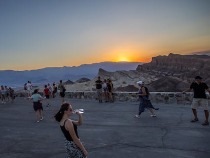 LOS ANGELES, CA - JULY 19 - Tourist watch the sunset at Zabriskie Point in Death Valley National Park on July 19, 2023. California's famous Death Valley, one of the hottest places on Earth, had reached a sizzling 124F (51C) on this afternoon. (Photo by Apu Gomes)