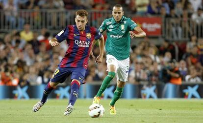 Munir conduce el balón durante el Gamper.