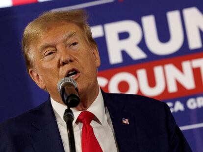 Former U.S. President and Republican presidential candidate Donald Trump rallies with supporters at a Whiskey bar in Ankeny, Iowa, December 2, 2023.