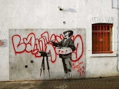 Un <b><i>graffiti</b></i> pintado en Portobello Road, Londres, y atribuido a Banksy, que fue vendido el pasado enero en eBay por 250.000 euros.