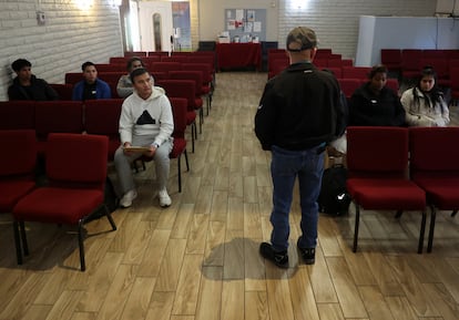 Pastor Hector Ramirez talks to migrants at his church about U.S. President Donald Trump's administration's new policy allowing Immigrations and Customs Enforcement (ICE) agents to enter churches to make arrests, in Mesa, Arizona, U.S. January 23, 2025