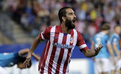 GRA520. MADRID, 18/09/2013.- El jugador del Atlético de Madrid Arda Turan celebra tras marcar el segundo gol ante el Zenit, durante el partido de la Liga de Campeones disputado esta noche en el estadio Vicente Calderón, en Madrid. EFE/Kiko Huesca