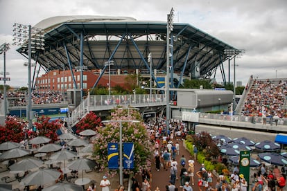 People navigate the grounds in front of Arthur Ashe Stadium during the US Open Tennis Championships at the USTA National Tennis Center in Flushing Meadows, New York, USA, 28 August 2023.