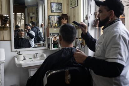 A client receives a service at one of the French Hairdressing salons in the Yungay neighborhood.