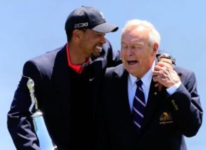 Tiger y Arnold Palmer.