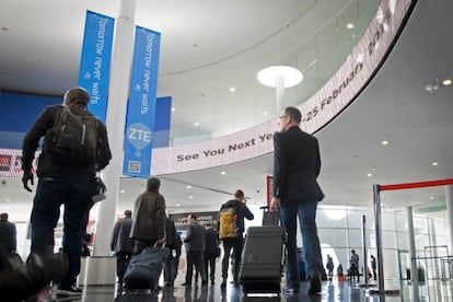 Conference-goers during the final day of this year's Mobile World Congress in Barcelona.