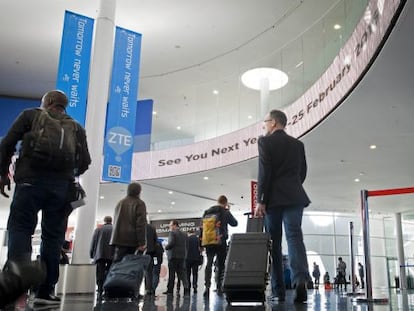 Conference-goers during the final day of this year's Mobile World Congress in Barcelona.