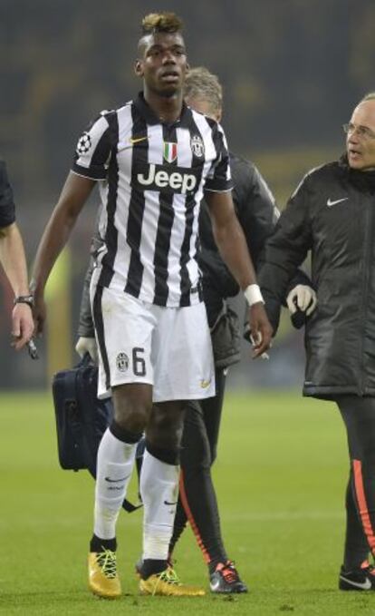 Pogba se retira lesionado ante el Dormund.