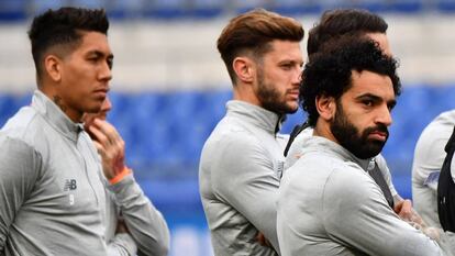 Os jogadores do Liverpool se preparam para o jogo contra a Roma.