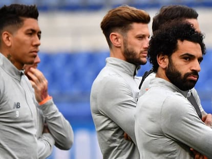 Os jogadores do Liverpool se preparam para o jogo contra a Roma.