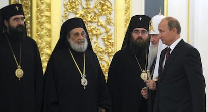 Vladimir Putin junto al patriacta Kirill.