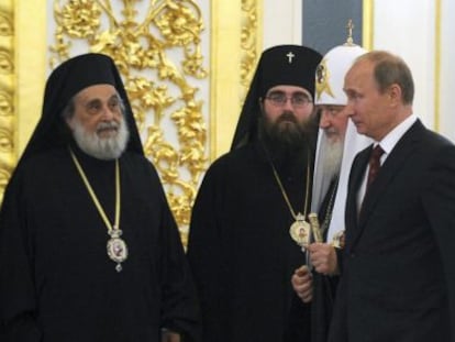 Vladimir Putin junto al patriacta Kirill.