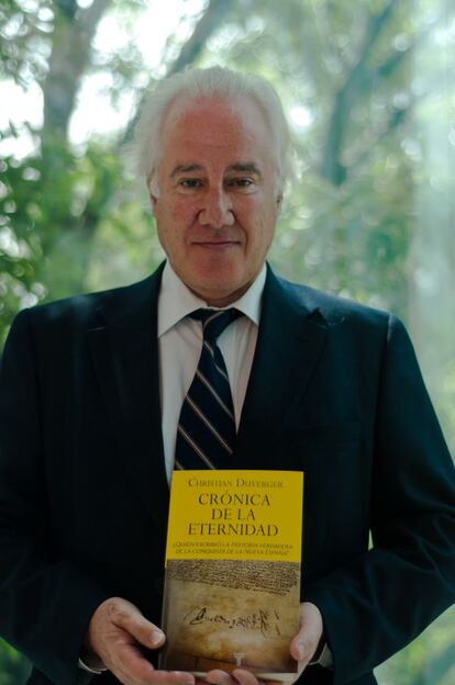 French historian Christian Duverger with his book.