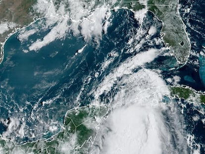 Tropical Storm Idalia makes its way to Cuba and Florida's west coast in a composite image from the National Oceanic and Atmospheric Administration (NOAA) GOES-East weather satellite, on Aug. 28, 2023.