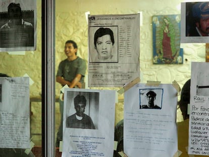 Missing people signs in the window of a migrant shelter in the city of Tijuana, in a file image.