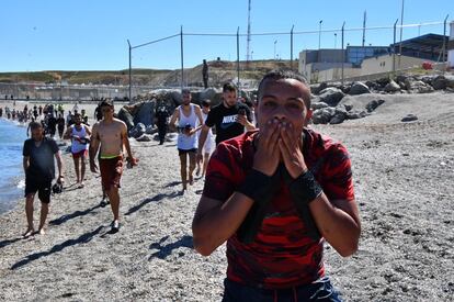 Migrants arrive in Ceuta on Monday after swimming ashore.