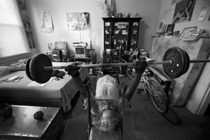 BALTIMORE, MD - NOVEMBER 02: Keith Boissiere bench presses in his bedroom on November 2, 2016 in Baltimore, Maryland. The 'Running Man' lives in solitude in a small West Baltimore apartment where his bedroom functions as his: dining area, weight room and sleeping quarters. Fitness model posters line the walls that serve as daily inspiration. "I admire them and the way they take care of their bodies," Boissiere said. He says running doesn't support all the muscles in the body, so he routinely weight lifts. "It's about having overall fitness, not concentrating on this while you neglect that," Boissiere said. Keith Boissiere has been running nearly every day for the past three decades - averaging more than 20 miles per day - for his health. Many residents only know the enigmatic figure by his nickname of the 'Running Man' - but Boissiere, 64, is a green-card-carrying Trinidad and Tobago native living in solitude on the border of Harlem Park and Sandtown-Winchester: two menacing neighborhoods in Baltimore City. Having never competed, nor having a desire to do so, the 'Running Man' held a daily streak of 12 and a half years which helped him earn his alias. But his health took a turn for the worse in 2008 - the streak ended - as his life almost did, too. Through all of his troubles, which includes being on a kidney donor recipient list, Boissiere copes the only way he knows how - he continues to run - as the hospital encouraged him to do in order to aid his failing health. He doesn't brag about his accomplishments or mention his celebrity-like status despite being constantly acknowledged - and these days barriers such as rain, snow and hospital appointments often dictate his running schedule. His drive and passion for his own health is often described as bringing positivity and strength to residents in the city, and the people of Baltimore still witness the 'Running Man' from West to East, and North to South, as he competes with only himself to stay upright by s
== FOR NE