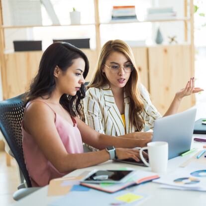 Young women working as together in the office