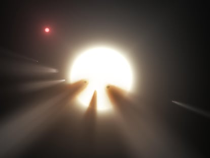 Esta representación artística muestra una estrella detrás de un cometa destrozado, una de las teorías que explicarían el inusual comportamiento de la estrella KIC 8462852.