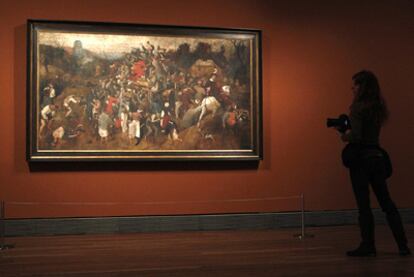 <i>El vino de la fiesta de San Martín</i>, de Peter Bruegel el Viejo, en el Museo del Prado.