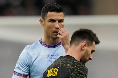 Cristiano Ronaldo gestures playing for a combined XI of Saudi Arabian teams Al Nassr and Al Hilal is flanked by PSG's Lionel Messi during a friendly soccer match, at the King Saud University Stadium, in Riyadh, Saudi Arabia, Thursday, Jan. 19, 2023.