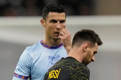 Cristiano Ronaldo gestures playing for a combined XI of Saudi Arabian teams Al Nassr and Al Hilal is flanked by PSG's Lionel Messi during a friendly soccer match, at the King Saud University Stadium, in Riyadh, Saudi Arabia, Thursday, Jan. 19, 2023.