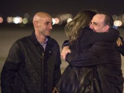 Marc Marginedas (right) is welcomed home by his family Barcelona.