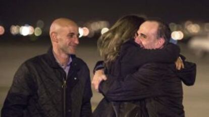 Marc Marginedas (right) is welcomed home by his family Barcelona.