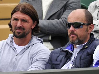 Ivanisevic, izquierda, durante el primer día de Wimbledon 2013