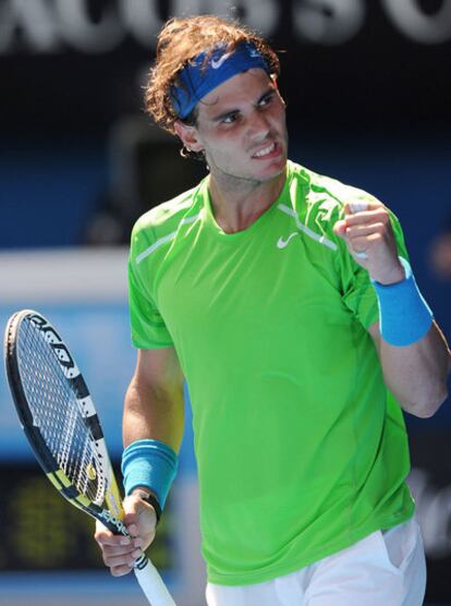 Rafa Nadal celebrates a point won against Tommy Haas.