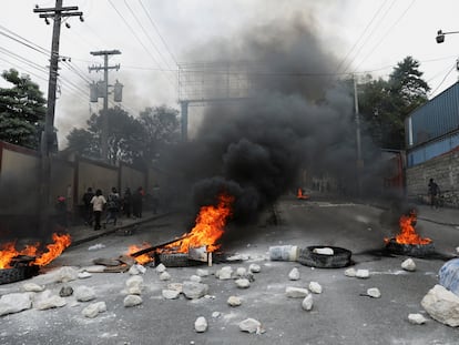 A view shows a burning barricade set up in protest against the government and calling for the resignation of Prime Minister Ariel Henry, in Port-au-Prince, Haiti February 5, 2024.