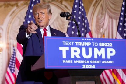 Former President Donald Trump gestures as he announces he is running for president for the third time as he speaks at Mar-a-Lago in Palm Beach, Nov. 15, 2022.