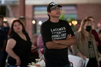 A man attends a campaign event for Republican congressional candidate Monica De La Cruz and Representative Mayra Flores.