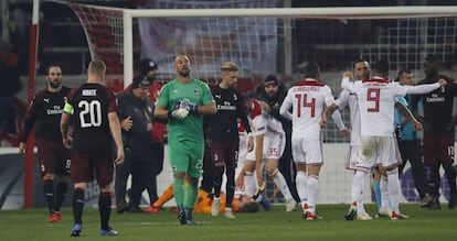 Los jugadores del Olympiacos celebran la victoria sobre el Milan.