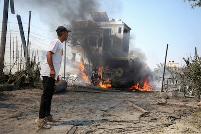 A man looks at the damage caused by the Israeli attack in Al Mawasi on Saturday. 