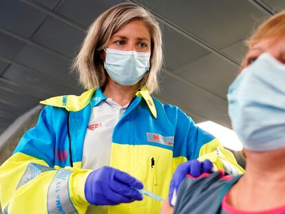 A woman receiving a dose of the AstraZeneca vaccine at the WiZink center in Madrid on Wednesday.