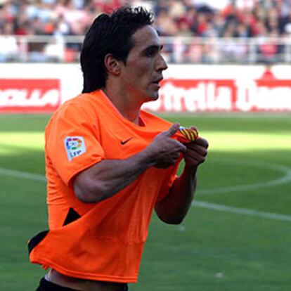 Vicente celebra el gol al Sevilla que dio el título al Valencia.