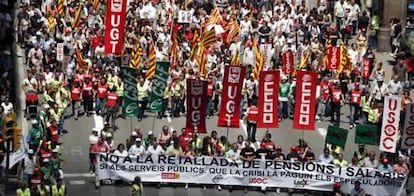 Cabecera de la manifestación de funcionarios celebrada hoy por el centro de Barcelona