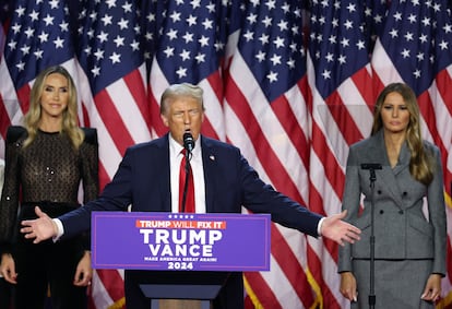 Donald Trump, flanked by his daughter-in-law Lara Trump and his wife, Melania Trump (right).