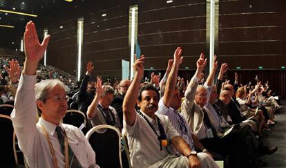 Votaci&oacute;n de resoluciones el 30 de agosto pasado en la asamblea de la Uni&oacute;n Astron&oacute;mica Internacional en Pek&iacute;n.