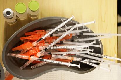 Pre-loaded syringes with COVID-19 vaccine are ready for use in New Orleans, on Jan. 25, 2022.