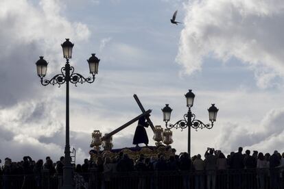 A ‘paso’ depicting Jesus the Nazarene, being carried over the Triana bridge in Seville on Good Friday.