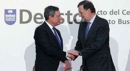 Mario Draghi, presidente del BCE, y Mariano Rajoy, presidente del Gobierno