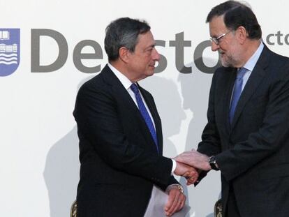 Mario Draghi, presidente del BCE, y Mariano Rajoy, presidente del Gobierno