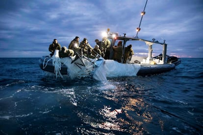 Sailors assigned to Explosive Ordnance Disposal Group 2 recover a suspected Chinese high-altitude surveillance balloon that was downed by the United States over the weekend over US territorial waters off the coast of Myrtle Beach.