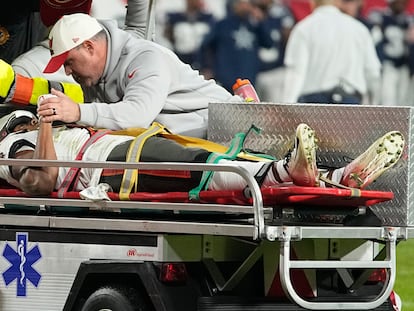 Russell Gage is taken off the field after being injured against the Dallas Cowboys, on Monday, in Tampa, Fla.