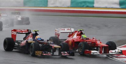 Jean-Eric Vergne, de Toro Rosso, y Felipe Massa, de Ferrari, durante la carrera.