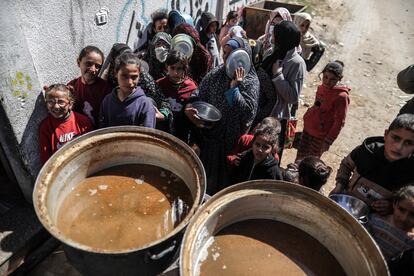 Food distribution in Deir al-Balah, central Gaza, February 29.
